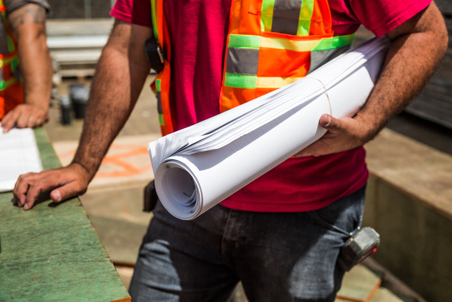 building-plans-in-hand Location roulottes de chantier